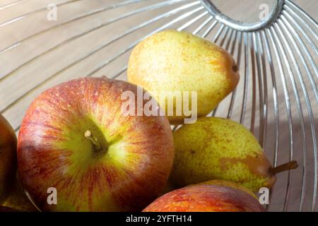 Close-up of apples and pears in the fruit basket Stock Photo