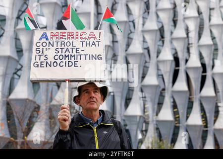 2nd Nov 2024. Palestine Solidarity Coalition march, London, UK. ‘Politics is Broken’ bloc Just Stop Oil ‘Umbrella’ campaign has five demands:  Stop arming Israel, tax the rich, just stop oil by 2023, replace the House of Lords with a House of the People and end political corruption. Stock Photo