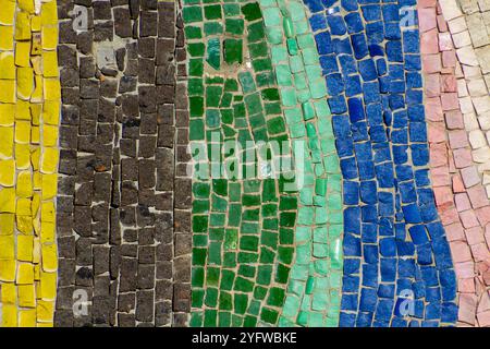 Colorful ceramic mosaic wall texture - handmade square tile design.  Old vintage abstract multicolor stone mosaic of the Soviet Union Stock Photo