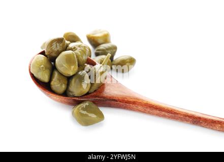 Wooden spoon and capers on white background Stock Photo