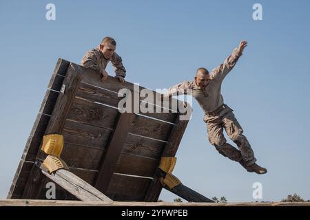 San Diego, California, USA. 23rd Sep, 2024. U.S. Marine Corps recruits with Golf Company, 2nd Recruit Training Battalion, execute an obstacle during the confidence course training event at Marine Corps Recruit Depot San Diego, California, Sept. 23, 2024. The confidence course challenges recruits physically and mentally through obstacles that require confidence in their strength, balance, and determination. (Credit Image: © Sarah Grawcock/U.S. Marines/ZUMA Press Wire) EDITORIAL USAGE ONLY! Not for Commercial USAGE! Stock Photo