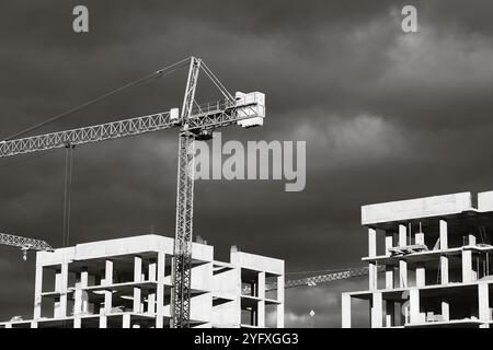 Uzhhorod, Ukraine. 4th Nov, 2024. High-rise buildings under construction, featuring unfinished concrete and brick structures. While intense fighting continues in eastern Ukraine, the western regions are experiencing a construction boom. Cities in western Ukraine, such as Lviv, Ivano-Frankivsk, and Uzhhorod, have become hubs of active building and infrastructure development. These areas are attracting both internally displaced people and new investors, driving demand for housing, commercial real estate, and public facilities. The economic growth in the western regions contrasts sharply with Stock Photo