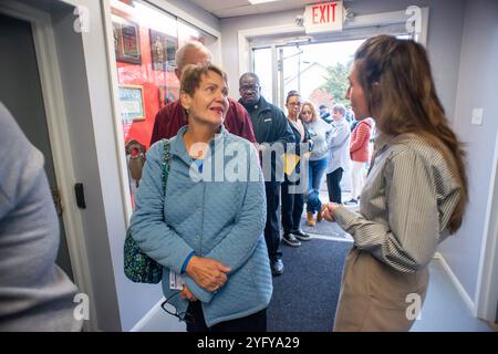 Bensalem, United States. 05th Nov, 2024. Congressional candidate Ashley Ehasz speaks with a voter after casting her ballot in the Presidential Election Tuesday, November 05, 2024 at Union Fire Company in Bensalem. Credit: William Thomas Cain/Alamy Live News Stock Photo
