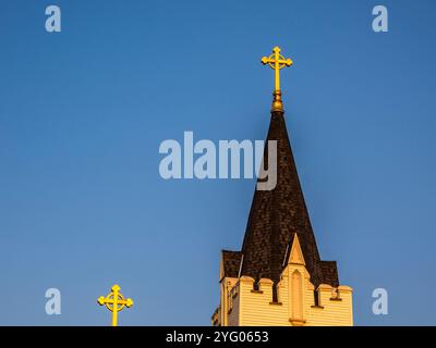 Crosses on Our Lady Queen of Peace Catholic Church in the  coastal town of Boothbay Harbor Maine Stock Photo