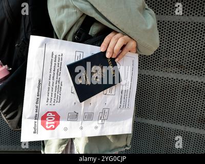 To cast their vote, North American citizens in Mexico went to the American Embassy, where the staff allowed access to one person at a time for security reasons; Each citizen requested their ballot via e-mail or requested it in this building; They later entered personal data, information about their State of origin and the name of the candidate of their choice, whether Democrat (Kamala Harris) or Republican (Donald Trump). This presidential election is very important in history because there is the possibility that it will be governed by a woman in the history of America on November 5, 2024 in Stock Photo