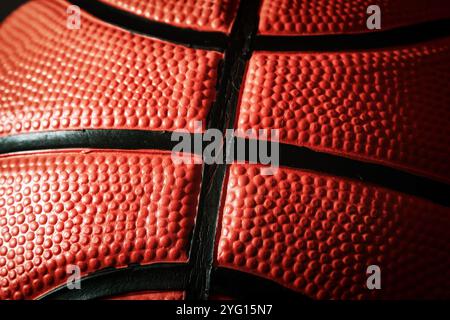 Closeup macro pinky texture of official leather basketball. Streetball and hoops. Professional sports backgrounds Stock Photo