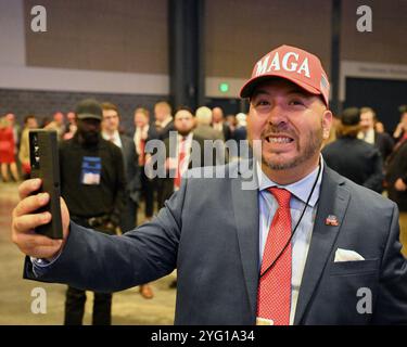 West Palm Beach, Florida November 5, 2024. A supporter of former President Donald Trump takes a selfie at the Palm Beach Convention Center at the Trump Campaign Election Night Watch Party in West Palm Beach, Florida on Tuesday, November 5, 2024. Photo by Joe Marino/UPI Credit: UPI/Alamy Live News Stock Photo