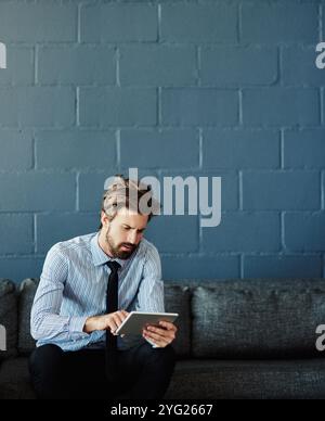 Digital, tablet and reading with business man for cloud solutions architect, it consultant or mockup. Web, framework and search with person on wall Stock Photo