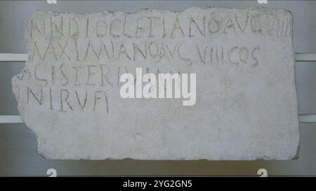 304AD. The acount is carved on the reserve side of a slab, which has been cut, dating from 134-135 AD. Consular dating and mention ot hte magister in Stock Photo