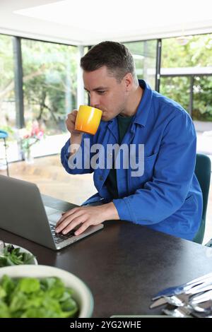 Man working on laptop Stock Photo