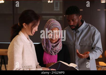 Diverse group of business people discussing in office Stock Photo