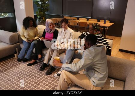 Employees having meeting in modern office Stock Photo