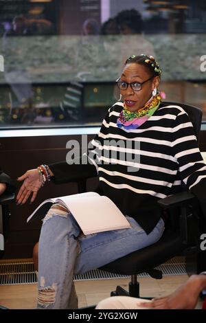 Woman talking during meeting in office Stock Photo