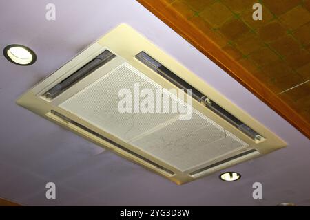 Dirty air conditioner in ceiling Stock Photo