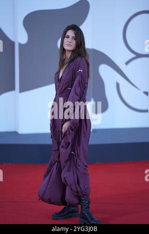 Guests attend the 'Kjaerlighet' red carpet during the 81st Venice International Film Festival at Palazzo del Cinema on September 06, 2024. Stock Photo