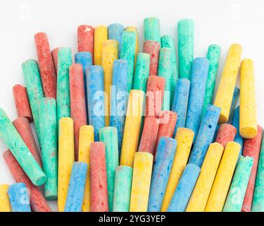 Close up of multicolor chalk on white background Stock Photo