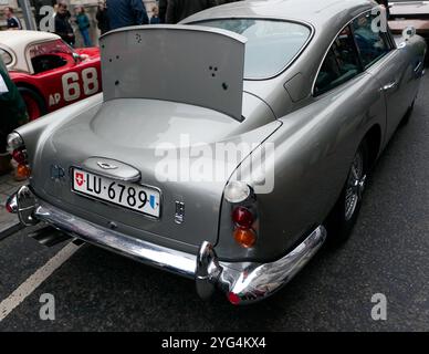 Rear  view of the Aston Martin DB5, used to promote the film, Goldfinger, in 1964. On display at the St James Motoring Spectacle 2024. Stock Photo