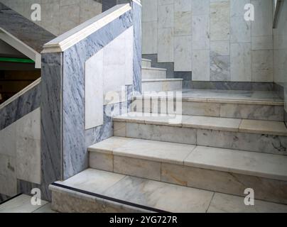 Fragment of a flight of stairs with marble finishing Stock Photo