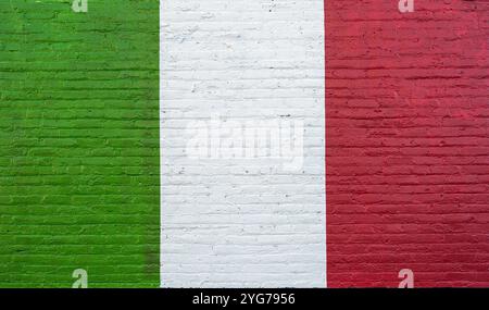 Background of a brick wall painted in Italian colors Stock Photo