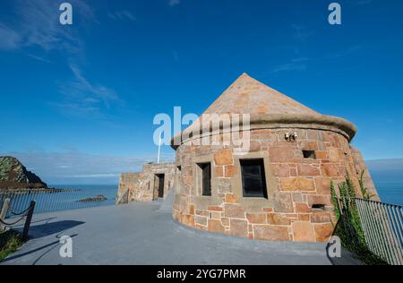 The Round Stone built La Crete fort on the Headland of La Crete Guarding Bonne Nuit Bay, Jersey, Channel Isles, UK. Stock Photo