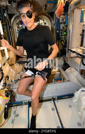 International Space Station, Earth Orbit. 29 October, 2024. NASA astronaut and Expedition 72 Commander Suni Williams wears a pirate's eye patch in celebration of Halloween aboard the International Space Station, October 29, 2024 in Earth Orbit. Williams was also a wearing a thigh cuff on her left leg testing its ability to prevent space-caused fluid shifts toward her head safeguarding eye health in microgravity. Credit: Astronaut Provided/NASA/Ģ����ý Live News Stock Photo