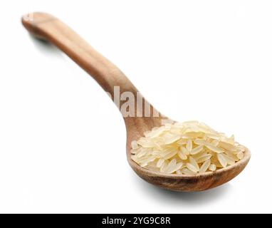 raw rice in wooden spoon isolated on white background Stock Photo