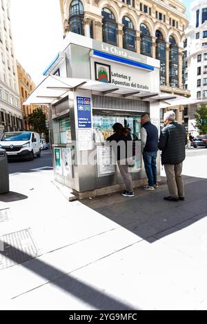 Madrid,  Spain- april 09, 2024 -  Unidentified people buy Spanish lottery in Gran Via Madrid Spain Stock Photo