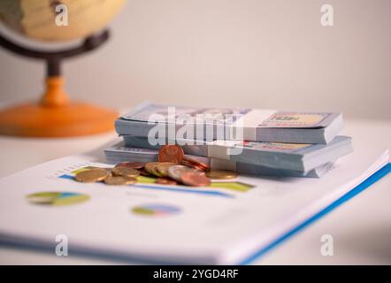 Effective finance management in business sector involves saving money, managing cash, and investing coins and currency to drive economic growth and st Stock Photo