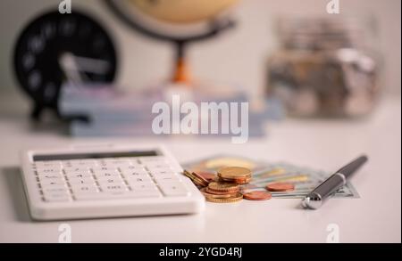 Effective finance management in business sector involves saving money, managing cash, and investing coins and currency to drive economic growth and st Stock Photo