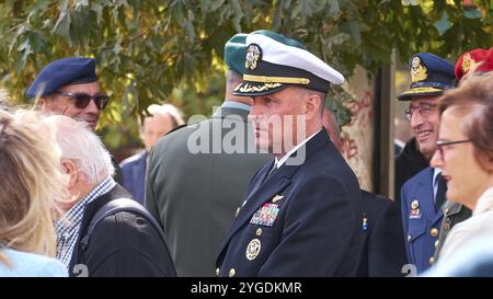 Greek naval officer in uniform talking to several people, Visit of the Federal President Frank-Walter Steinmeier in Kandanos on 31 October 2024, Feder Stock Photo