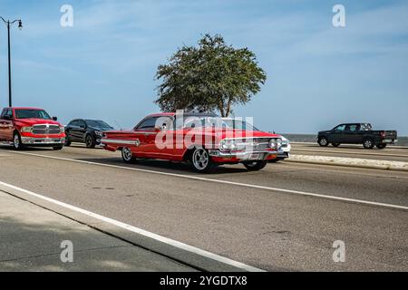 Gulfport, MS - October 04, 2023: Wide angle front corner view of a 1960 Chevrolet Impala Sport Coupe at a local car show. Stock Photo