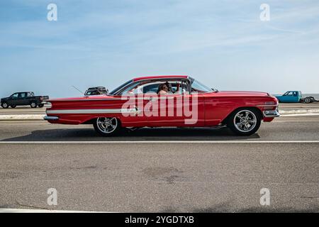 Gulfport, MS - October 04, 2023: Wide angle side view of a 1960 Chevrolet Impala Sport Coupe at a local car show. Stock Photo