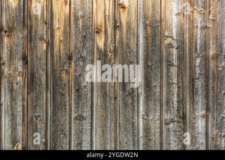 Closeup shot of brown, weathered wooden wall (background horizontal) Stock Photo