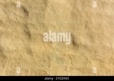 Background yellow, beige plastered wall Stock Photo