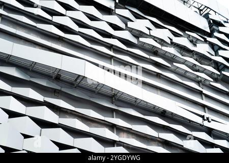 modern Aluminium composite material architecture gray color and Hexagon shape popup texture on exterior facade building. Stock Photo