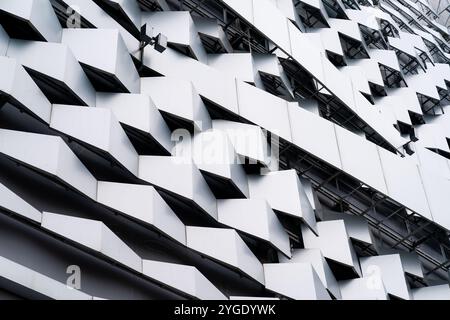 modern Aluminium composite material architecture gray color and Hexagon shape popup texture on exterior facade building. Stock Photo