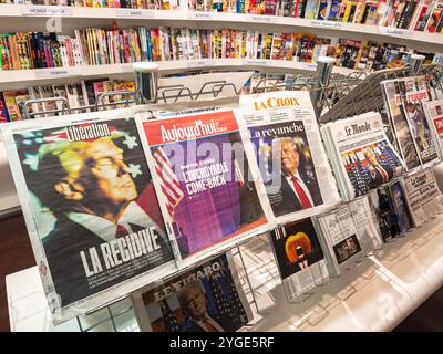 Paris, France - Nov 7, 2024: A display of French newspapers covering Donald Trump2024 presidential victory, featuring headlines such as Liberation La Recidive, Aujourd'hui en France L'incroyable Come-Back, and La Croix La Revanche, at a newsstand. Stock Photo