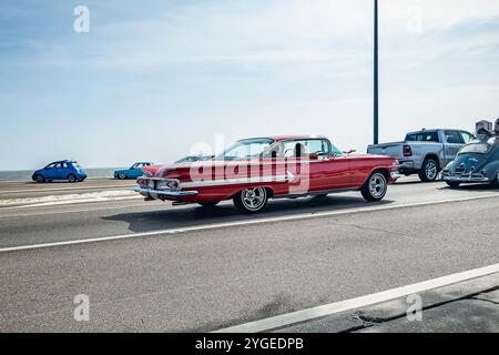 Gulfport, MS - October 04, 2023: Wide angle rear corner view of a 1960 Chevrolet Impala Sport Coupe at a local car show. Stock Photo