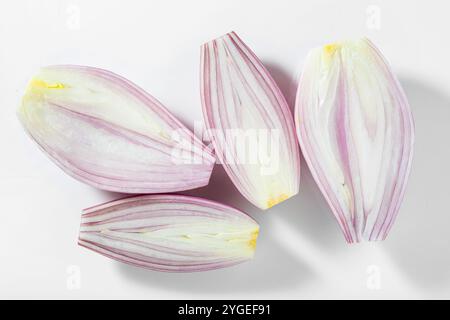 sliced ​​shallots on a white background Stock Photo