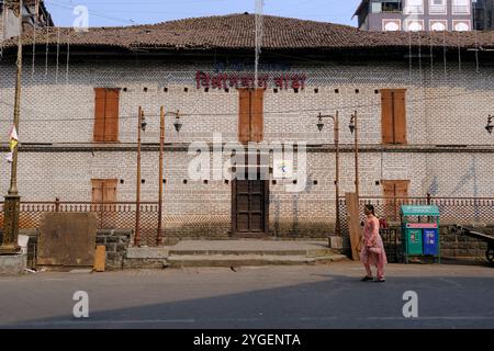 30 October 2024, Pune, India, Vishrambaug Wada, Richly wood carved door fixed in brickwork at entrance of Vishrambaug Wada second palace of Peshve the Stock Photo