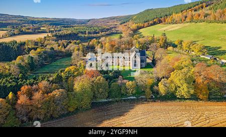 Pluscarden Abbey a Catholic Benedictine monastery near Elgin Scotland surrounded by fields and trees in autumn sunshine Stock Photo