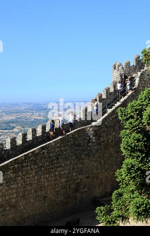 Sintra, Portugal - August 18 2016: Tourists Descend Stone Staircase at the Castle of the Moors on a Sunny Day. High quality photo Stock Photo