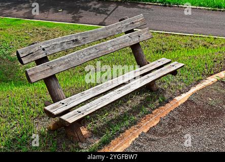 Wooden bench on park public park in Ribeirao Preto, Sao Paulo, Brazil Stock Photo