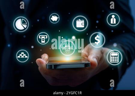 Hand of businessman using smart phone with finance icon Stock Photo
