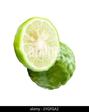 Top view of fresh green bergamot fruit or kaffir lime with half in stack is isolated on white background with clipping path. Stock Photo