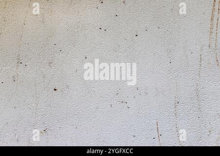 Abstract weathered texture stained old stucco light gray and aged paint white brick wall background. Brick wall may used as background. Stock Photo