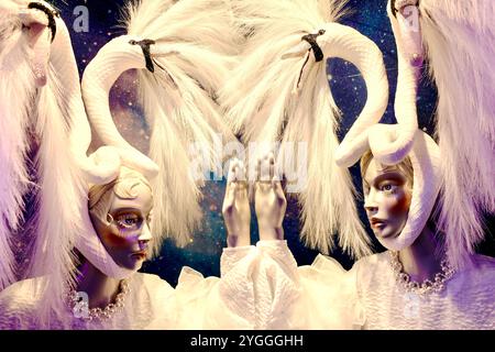 Christmas display in the window of Selfridges department store on Oxford Street, London, featuring Bespoi e Swans dresses by designer Simone Rocha. Stock Photo