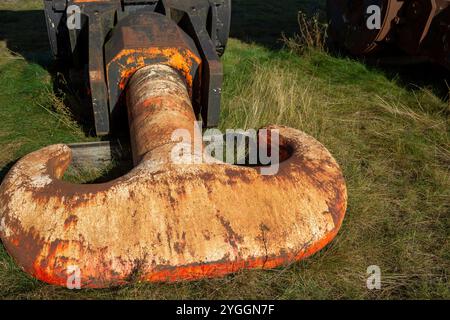 Rusty giant crane hook in the harbor Stock Photo