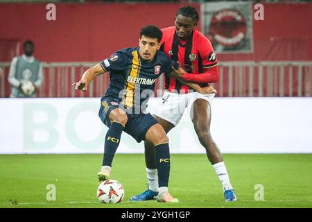 Nice, France, France. 7th Nov, 2024. Sayfallah LTAIEF of FC Twente and Moise BOMBITO of Nice during the UEFA Europa League, League Phase MD4 match between OGC Nice and FC Twente at Allianz Riviera Stadium on November 07, 2024 in Nice, France. (Credit Image: © Matthieu Mirville/ZUMA Press Wire) EDITORIAL USAGE ONLY! Not for Commercial USAGE! Stock Photo