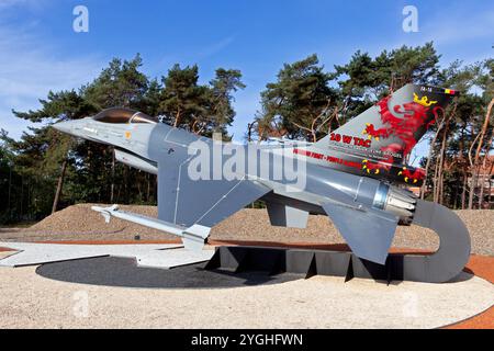 F-16 fighter jet as a gate guard at the entrance of Kleine-Brogel Air Base. Peer, Belgium - Sep 8, 2018 Stock Photo